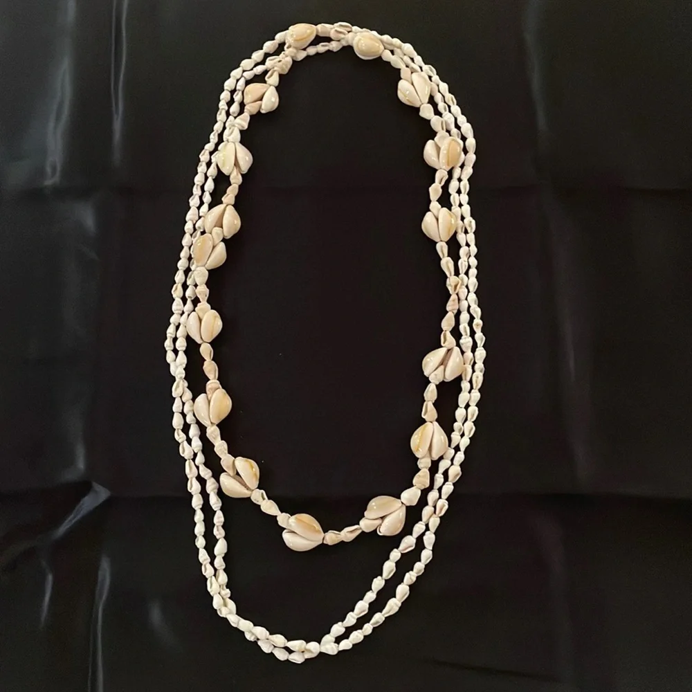 3 shell necklaces cowrie and periwinkles